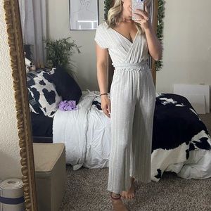 Size  Small petite tan jump suit